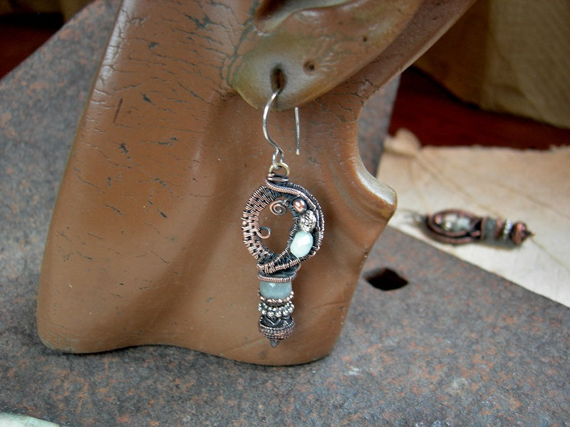 Seafoam earrings with faceted aquamarine & green moonstone, copper & silver beads and oxidized copper wire wrap. 