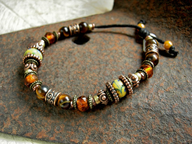 Adjustable glass & gemstone slider bracelet with antique Venetian glass, tiger eye, amber-orange faceted Czech glass & copper.