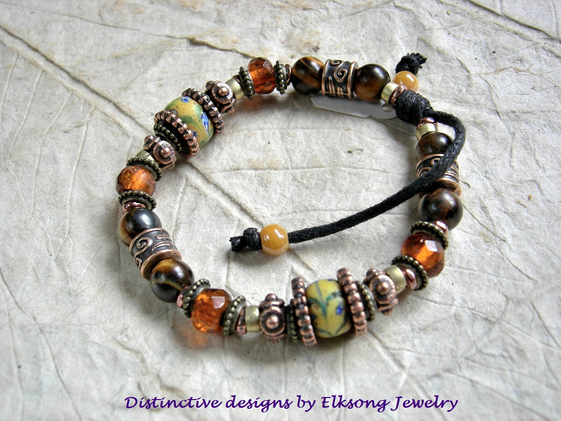 Sun Gold adjustable slider bracelet with antique Venetian glass, tiger eye, amber-orange faceted Czech glass & copper.