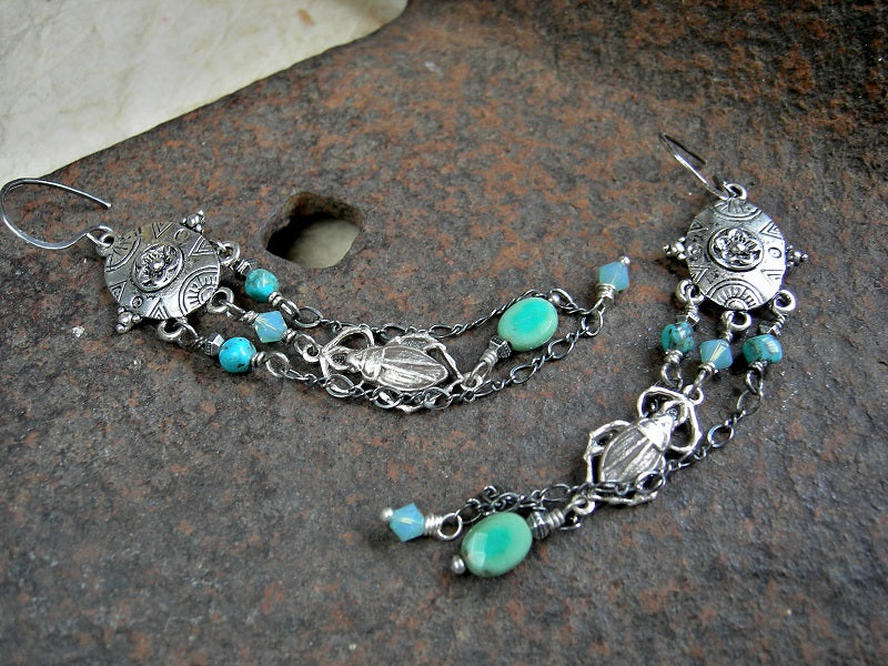 Slinky chandelier earrings with turquoise, sterling chain, chrysoprase & silver scarab charms.