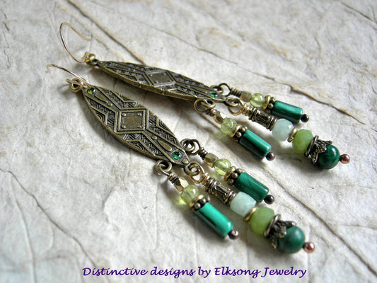 Green & golden chandelier earrings with elongated shield shapes, gemstone & brass and golden beads & caps. 
