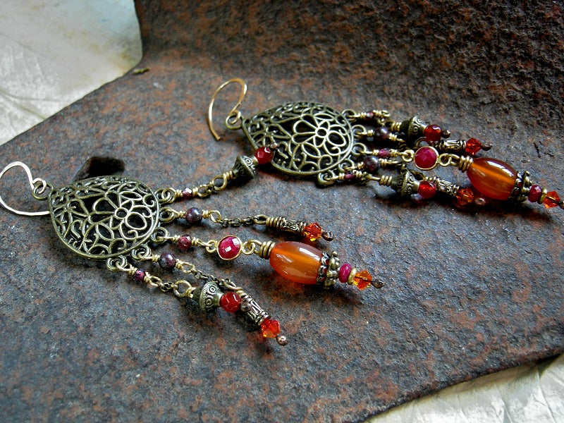 Chandelier style statement earrings with antiqued brass & gold, garnet, carnelian & ruby. 14kt gf ear wires.