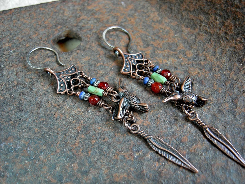 Chandelier style hummingbird earrings with colorful gemstone beads, copper hummingbird & feather charms, sterling ear wires.