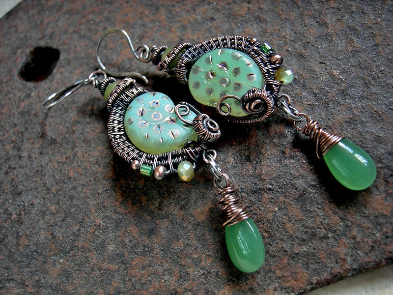 Boho luxe green & peacock spot nautilus earrings with oxidized copper wire wrap, jade beads & green glass tear drops.