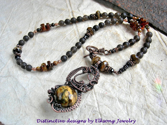 Tiger eye & copper wire wrap art necklace, with ornate focal & strung smoky quartz, tiger eye, black tourmaline & amber beads.
