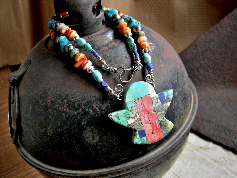 Colorful Thunder Bird necklace with hand cut focal of various turquoises, spiny oyster shell & lapis, strung with same beads & sterling silver bench beads.
