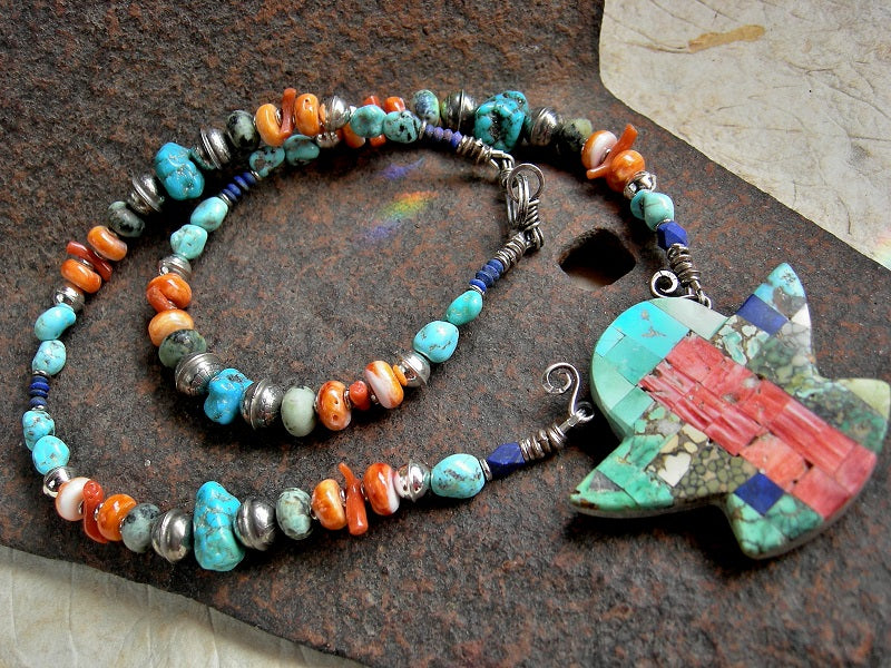 Boho statement necklace with hand cut stylized Thunder Bird focal of various turquoises, spiny oyster shell & lapis, strung with same beads & sterling silver bench beads.