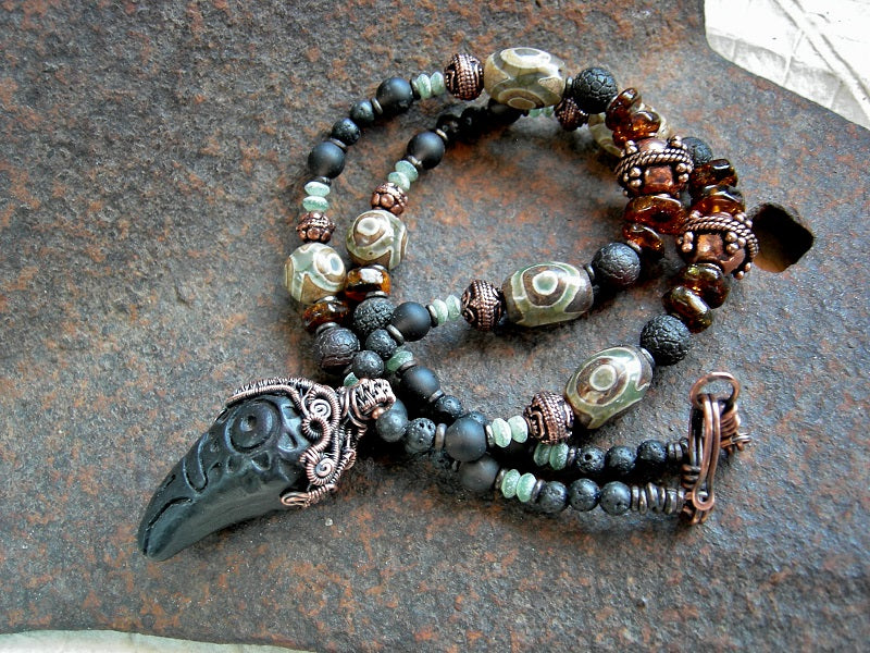 Unisex necklace with black clay raven head & copper wire wrap focal, dark mix of gemstone & copper strung bead necklace.