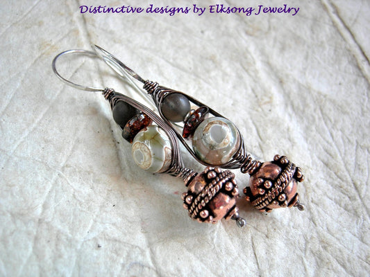 Agate & amber wrapped hook earrings with ornate copper beads & matte smoky quartz. Sterling ear wires.