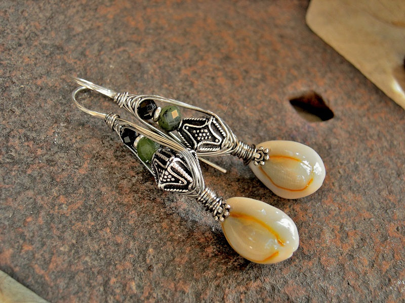 Wrapped sterling hook earrings with natural cowrie shells, faceted jade, black toumaline & Bali style sterling-over-copper bi-cone beads.
