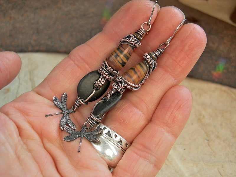 Boho luxe earrings with oxidized copper wire wrap, black & brown , stone, ceramic & dragonfly charms.