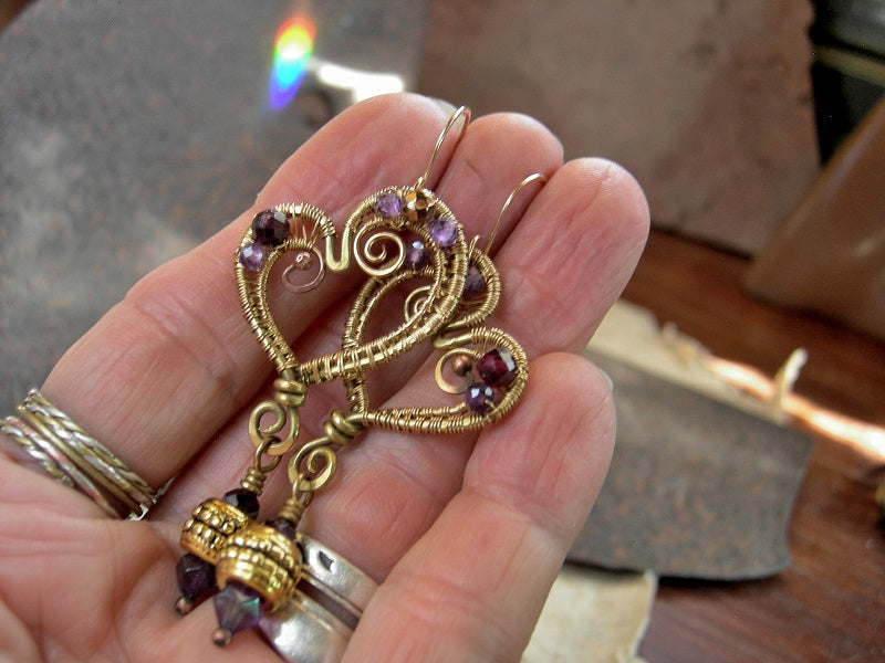 Boho luxe wire wrap earrings with abstract heart shapes, faceted amethyst, garnet & golden hematite. 14kt gold fill ear wires.