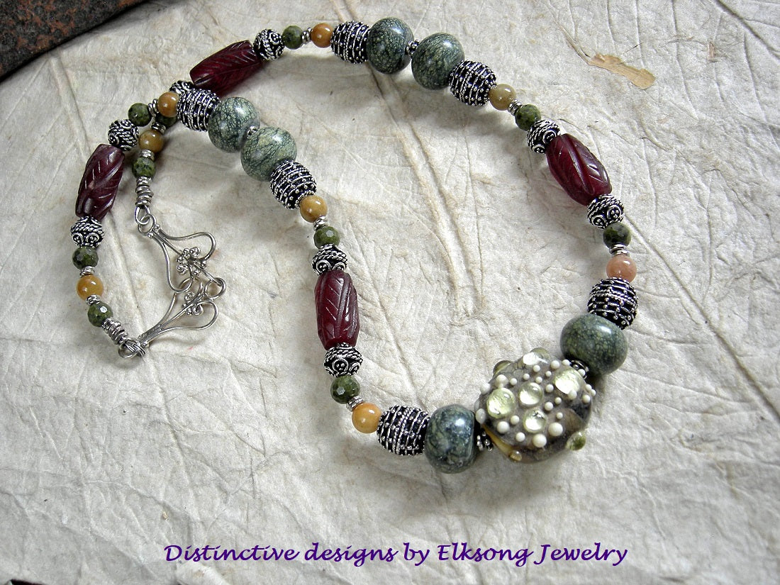 Lichen green, silver & red strung bead necklace with serpentine, agate, jade & epidote, sterling-over-copper beads & handmade lampwork glass art bead focal.