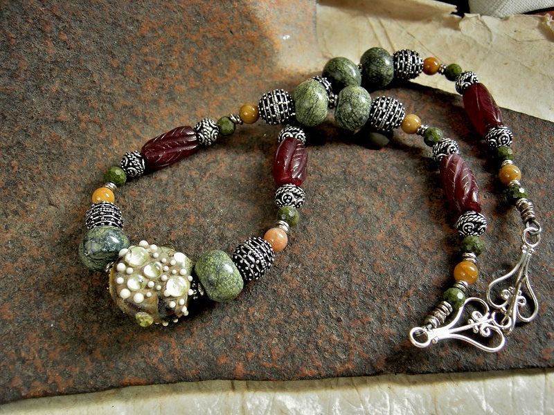 Unisex strung bead necklace with serpentine, red agate, gold jade & green epidote, sterling-over-copper beads & handmade lampwork glass art bead focal.