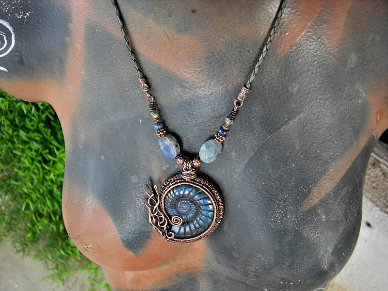 Cord necklace with carved labradorite nautilus & copper wire wrap focal, copper, lapis & labradorite beads.
