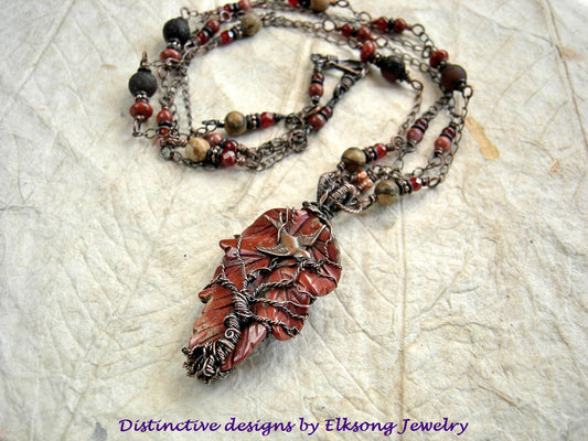 Necklace with red jasper leaf & copper wire wrap tree & swallow focal, double copper chain, carnelian & jasper beads.