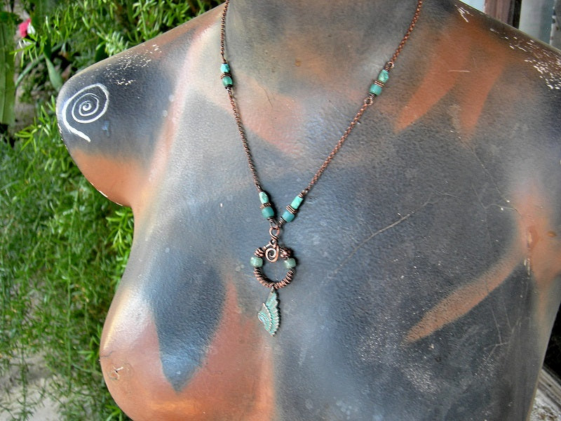 Little Wing necklace with copper chain, copper wire wrap focal with glass & copper beads, copper verdigris wing charm. Java glass & faceted turquoise beads.