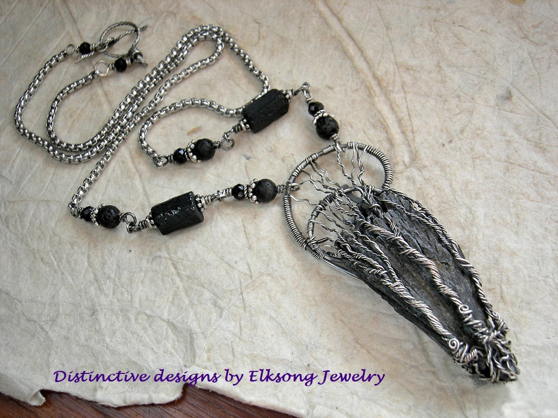 Three Graces silver wire wrap tree necklace with triple trees on black kyanite fan. Black gemstone beads & stainless steel box chain.