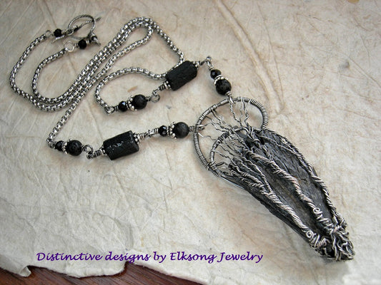 Three Graces silver wire wrap tree necklace with triple trees on black kyanite fan. Black gemstone beads & stainless steel box chain.