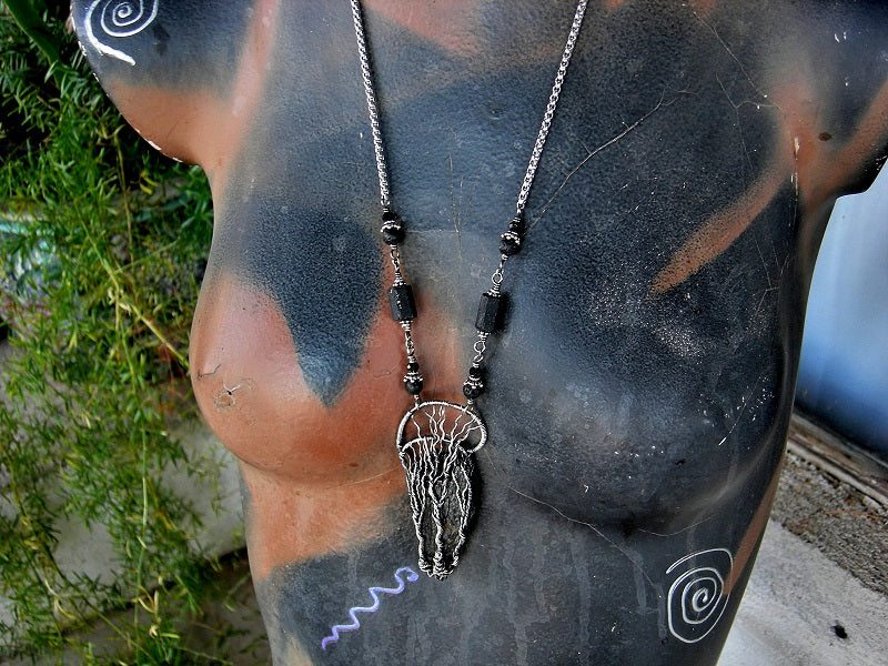 Statement necklace with sterling wire wrap trees on a black kyanite fan. Black gemstone beads & stainless steel box chain.