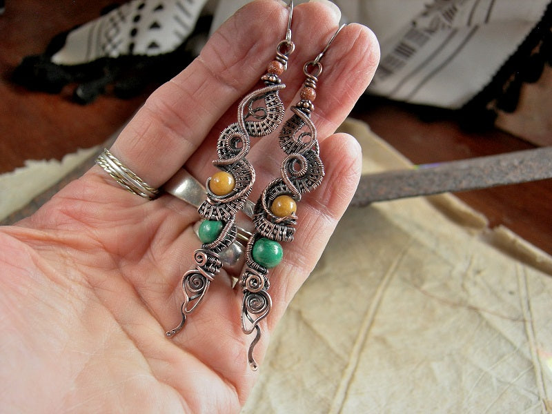 Copper wire wrap statement earrings with malachite, golden jade & goldstone rounds. Handmade sterling ear wires.