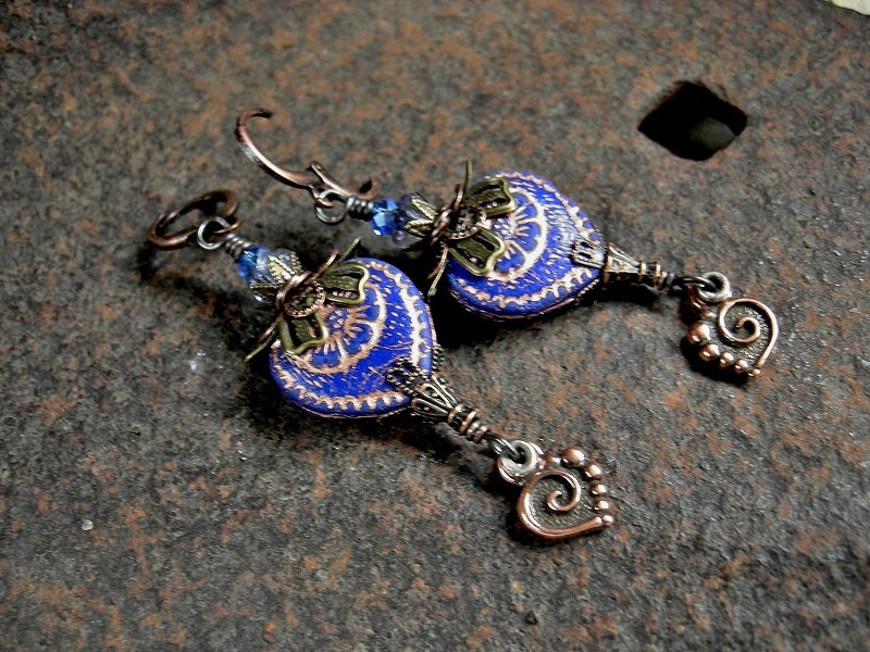 Boho romantic earrings with blue glass & copper hearts, glass flower beads, blue faceted crystal rondelles & antiqued copper filigree.