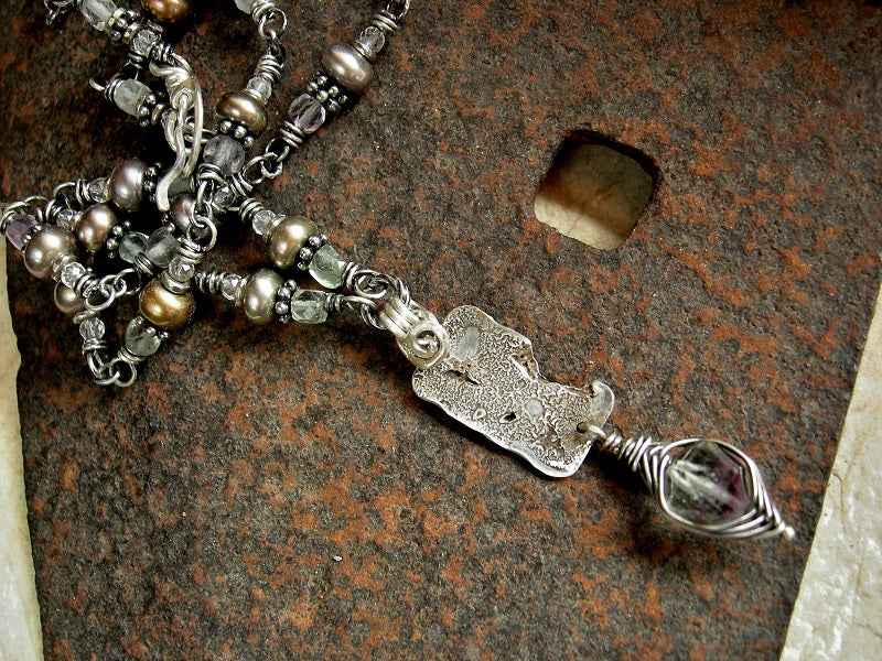 Seafoam necklace with sterling wrapped links, reticulated sterling focal and fluorite, crystal & freshwater pearl beads. Sterling toggle clasp.