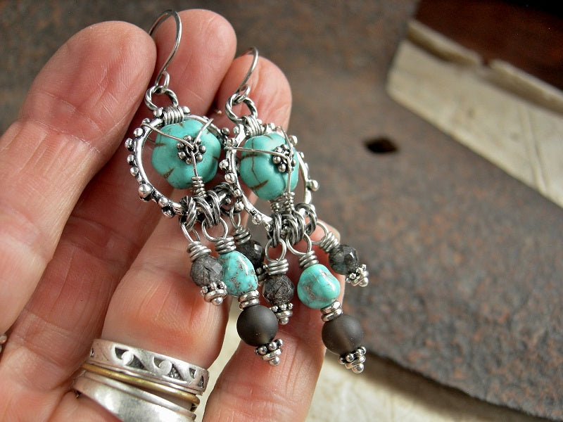 Boho luxe chandelier earrings with turquoise colored magnesite, silver finish granulation rings, smoky & black tourmalated quartz rounds & Morenci turquoise nuggets.