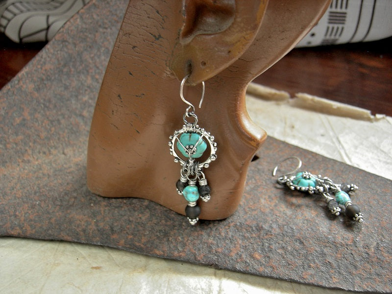 Unique earrings with turquoise colored magnesite, silver finish granulation rings, smoky & black tourmalated quartz rounds & Morenci turquoise nuggets.