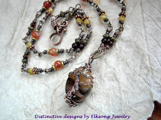 Evening Star copper tree wrap necklace with wire wrap links, copper & antiqued brass beads, amber nuggets & faceted rounds & carnelian.