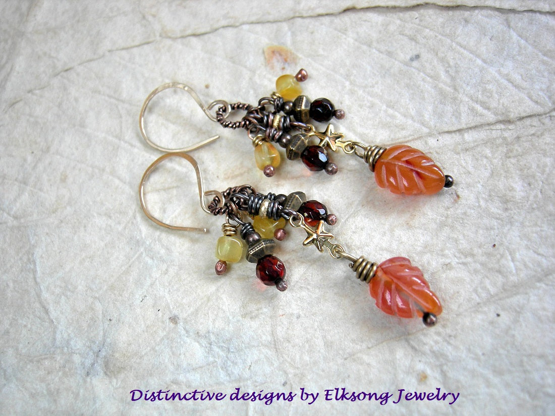Candy Cluster earrings with golden & dark cognac amber beads, leaf shaped carved carnelian beads, golden stars & 14kt gold filled ear wires.