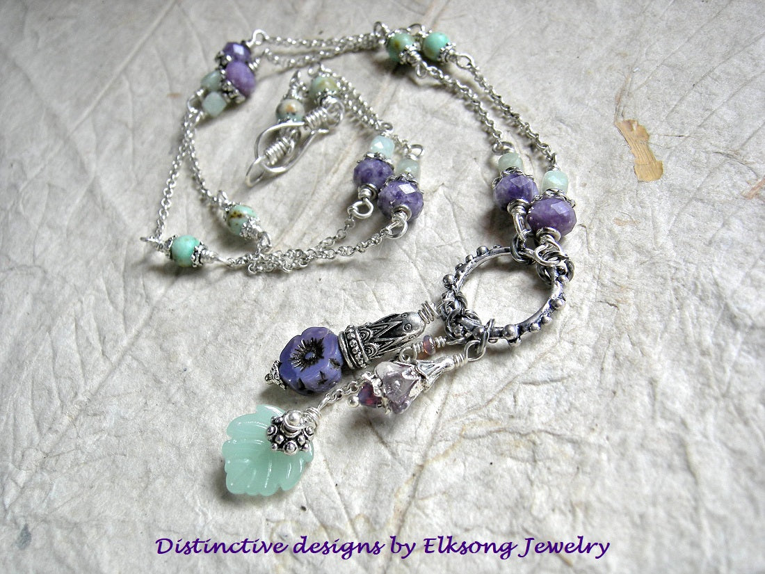 Violets in Spring, detailed silver chain pendant necklace with purple & green gemstone and glass flower & leaf beads.