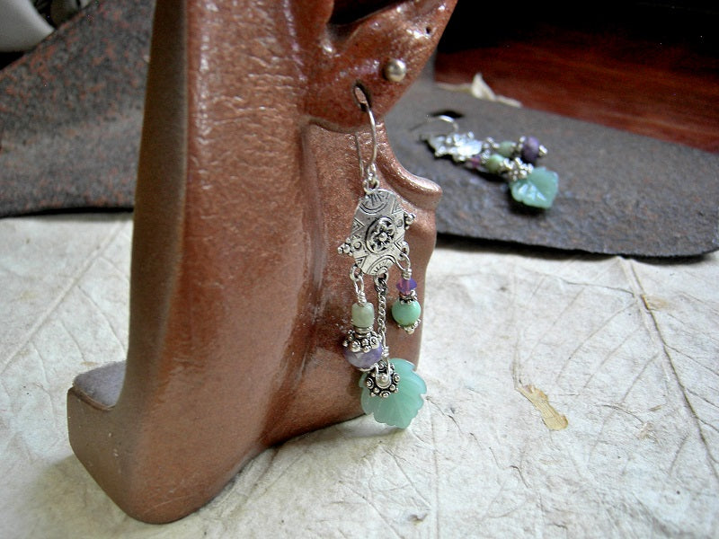 Chandelier earrings with green and purple stones, silver hangers & green glass leaves.