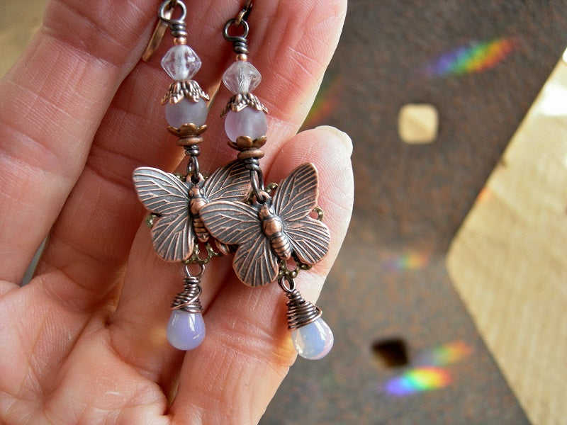 Spring themed copper butterfly earrings with frosted amethyst, vintage glass beads & pale purple opal glass teardrops.