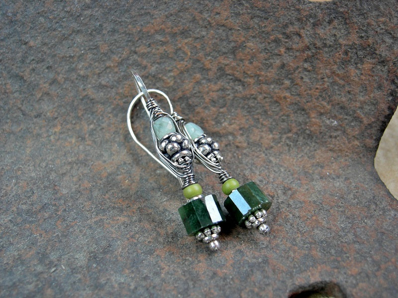 Green & silver wire wrapped hook earrings with dark & light faceted jade & sterling wire wrap. 
