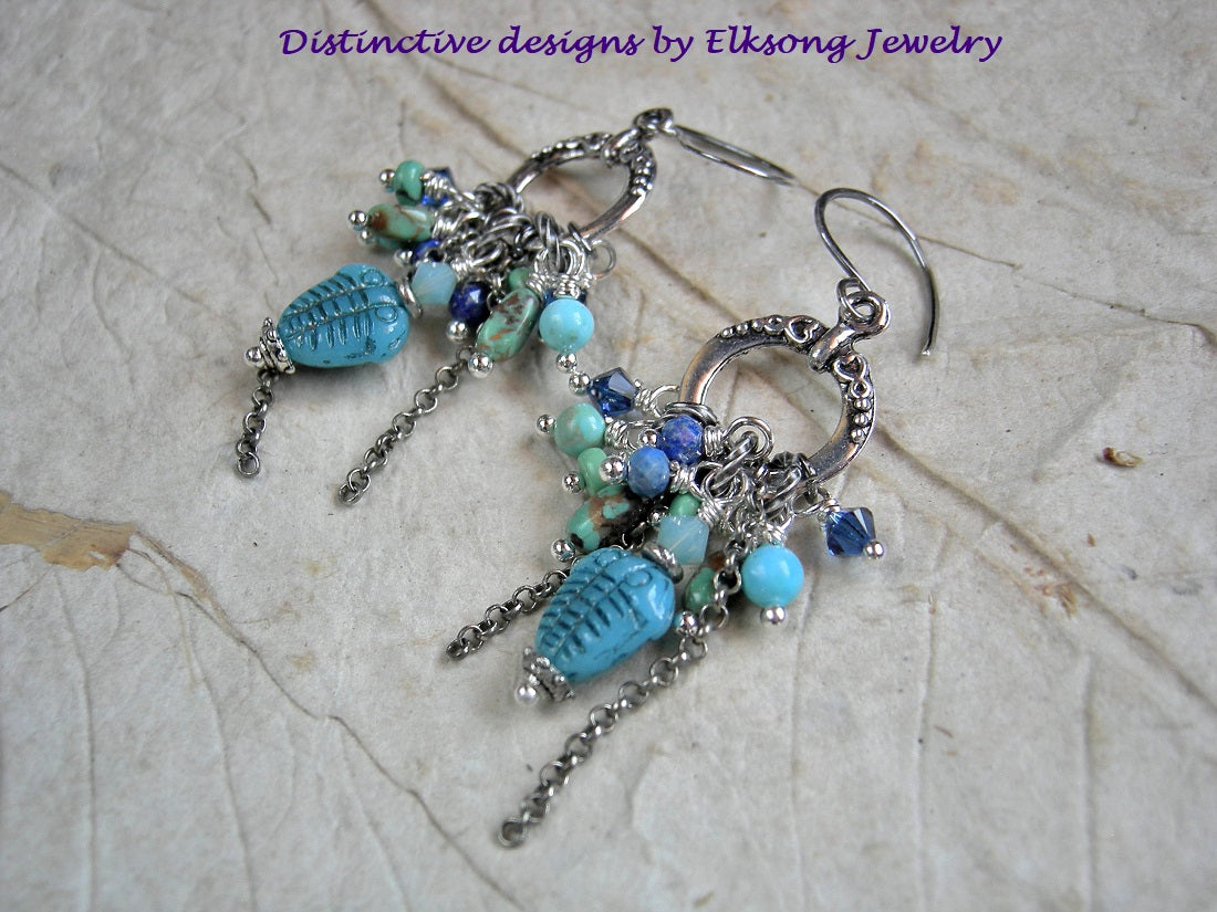 Deep Sea trilobite earrings, clusters of Swarovski crystal, faceted lapis, genuine turquoise & sterling chain falls.