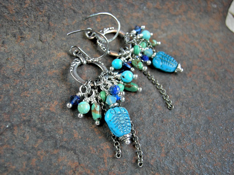 Boho cluster style earrings, with glass trilobite beads, Swarovski crystal, faceted lapis, genuine turquoise & sterling chain falls.