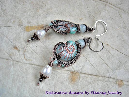 Queen of the Sea aqua glass nautilus bead & copper wire wrap earrings. Faceted aquamarine & freshwater pearls. 