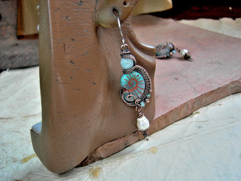 Bohemian aqua nautilus bead & copper wire wrap earrings with faceted aquamarine gemstone & freshwater pearls. 