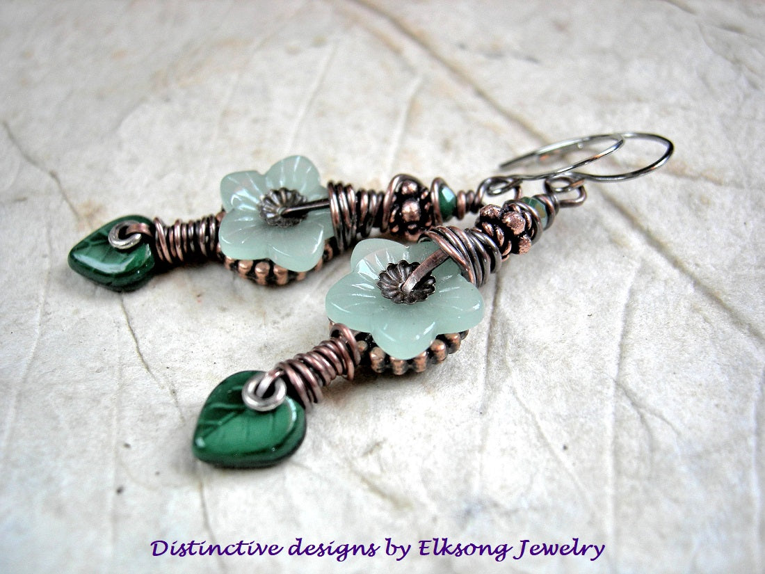 Green Spring earrings with glass flower & leaf beads, faceted crystal rondelles, copper details & wire wrapping. 