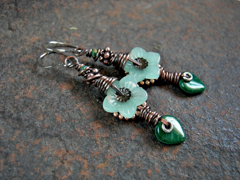 Delicate spring green earrings with glass flower & leaf beads, faceted crystal rondelles, copper details & wire wrapping. 