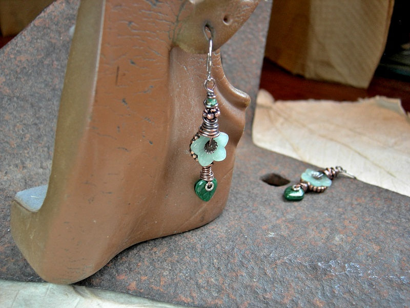 Green Spring earrings with glass flower & leaf beads, faceted crystal rondelles, copper details & wire wrapping. 