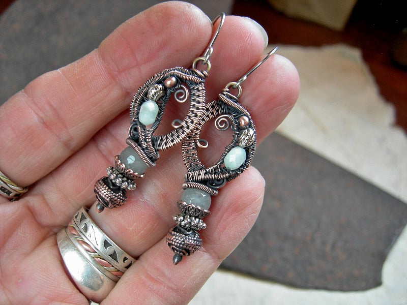 Boho wire wrap earrings with faceted aquamarine & green moonstone, copper & silver beads and oxidized copper wire wrap. 