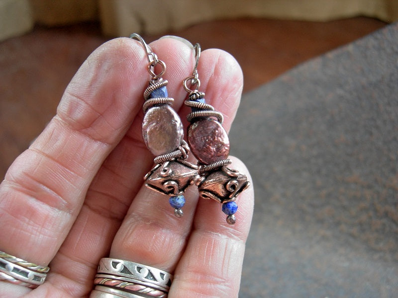 Coppery pearl & lapis earrings with ornate solid copper saucer beads & copper wire wrap coils. 