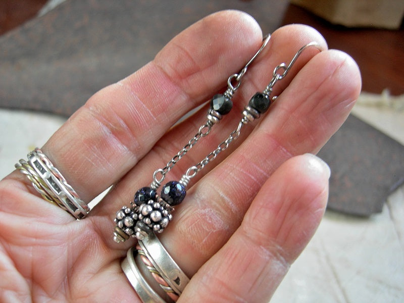 Drop earrings with faceted black obsidian & blue goldstone, sterling chain & silver Bali beads. 