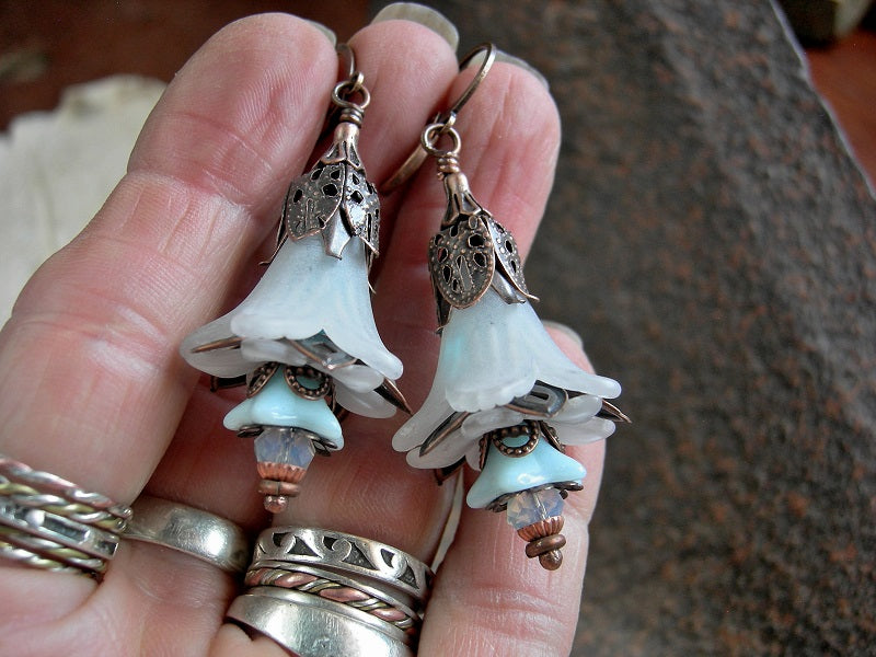 Seafoam flower earrings with white resin flowers, blue glass flowers, white opal crystal rondelles & copper filigree details. 