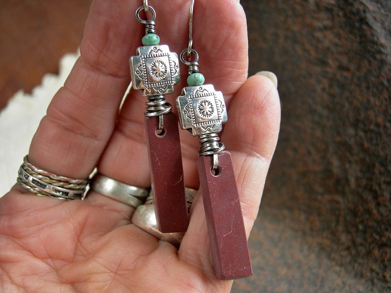 Earthy elegant earrings of hand cut pipestone tabs with southwest style silver beads, turquoise rondelles & oxidized sterling wire wrap and ear wires. 