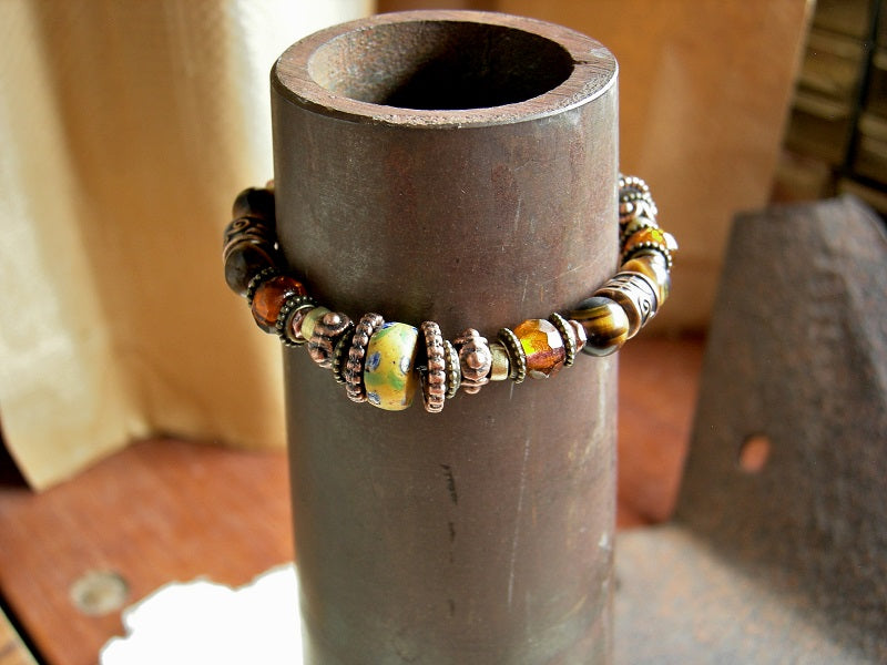 Boho adjustable slider bracelet with antique Venetian glass, tiger eye, amber-orange faceted Czech glass & copper. 