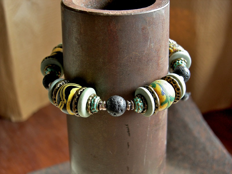 Black, gold & green adjustable slider unisex bracelet with chunky antique Venetian glass trade beads, Greek ceramic, black lava stone & brass. 