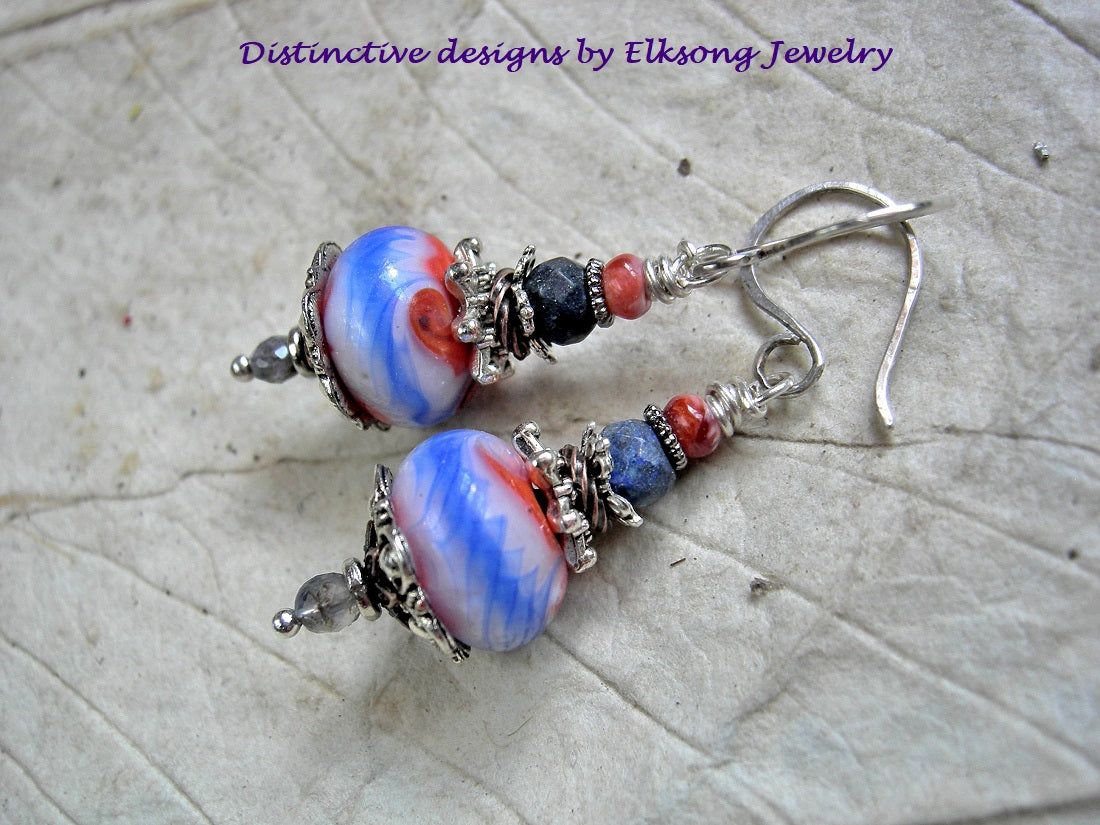 Art bead earrings with handmade coral/white/blue lampwork glass beads, iolite, lapis & spiny oyster shell. Sterling ear wires. 